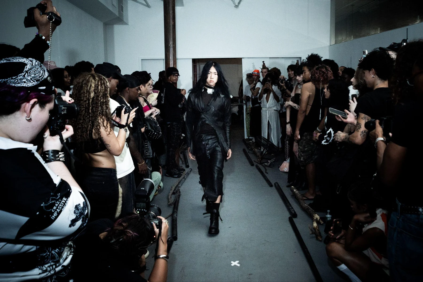 Double Welt Leather Capris / “Resistance” Fur Collar Jacket worn together on the runway