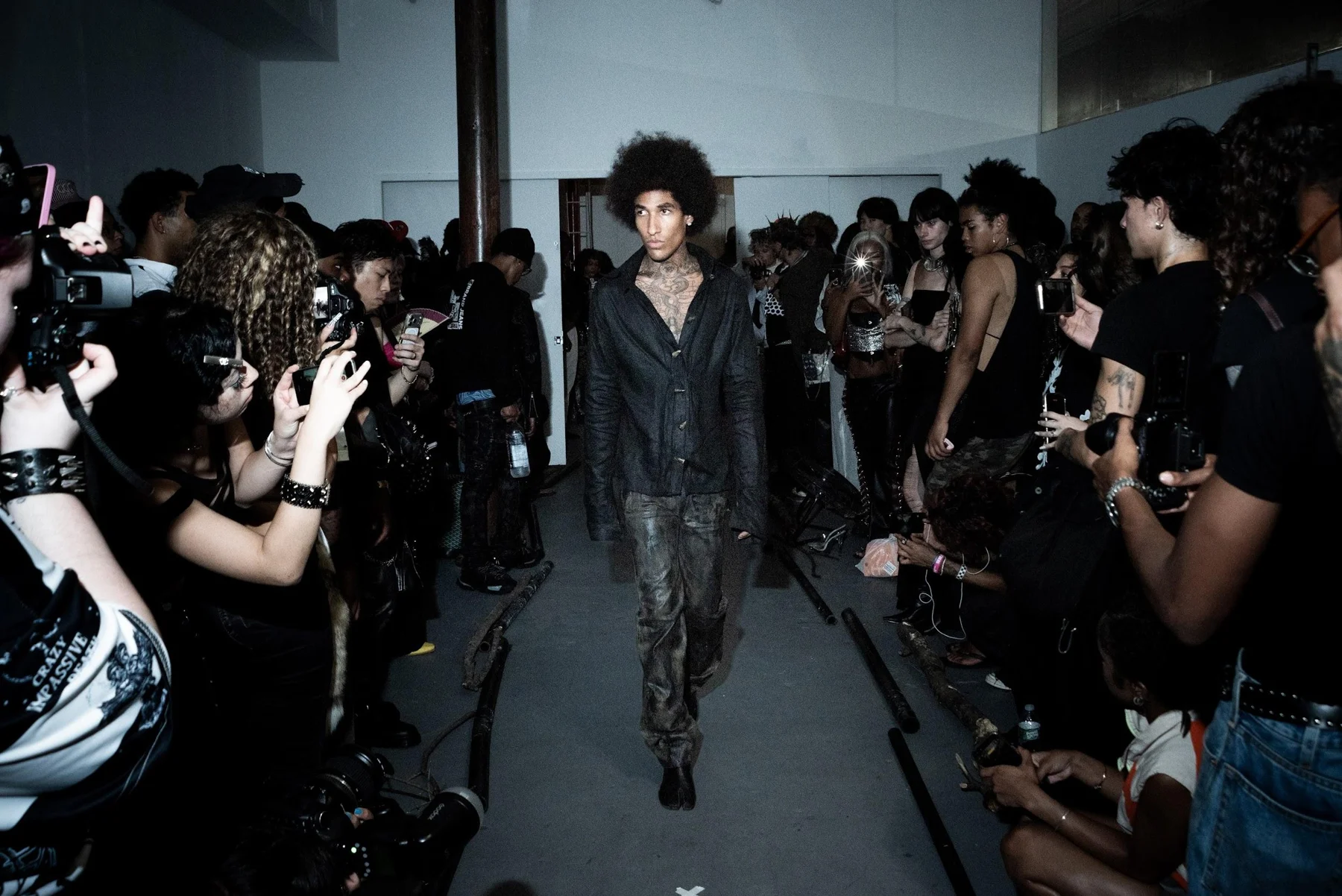 Black Horn Toggle Dress Shirt / “Raider” Waxed Denim worn together on the runway