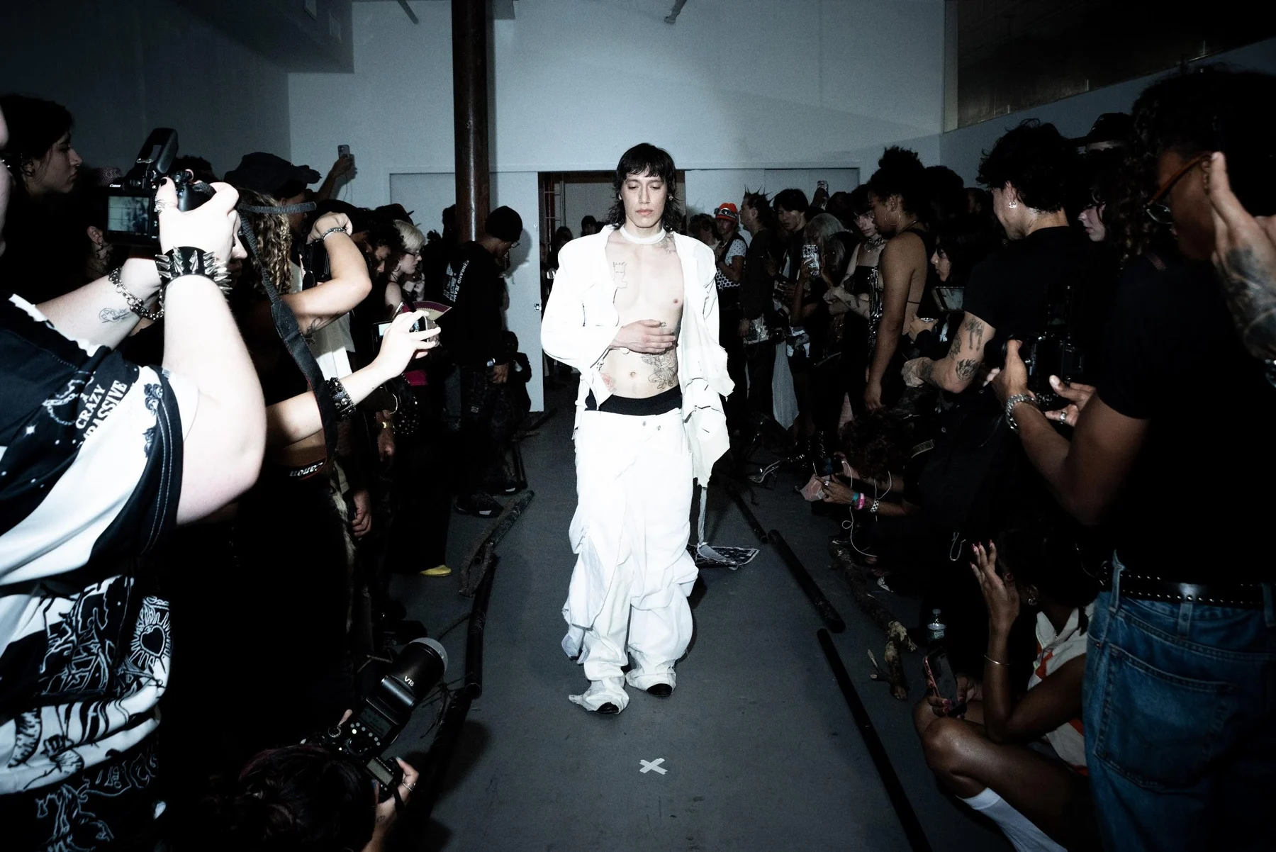 “Essence” White Leather Jacket / White “Androgyny” Denim worn together on the runway